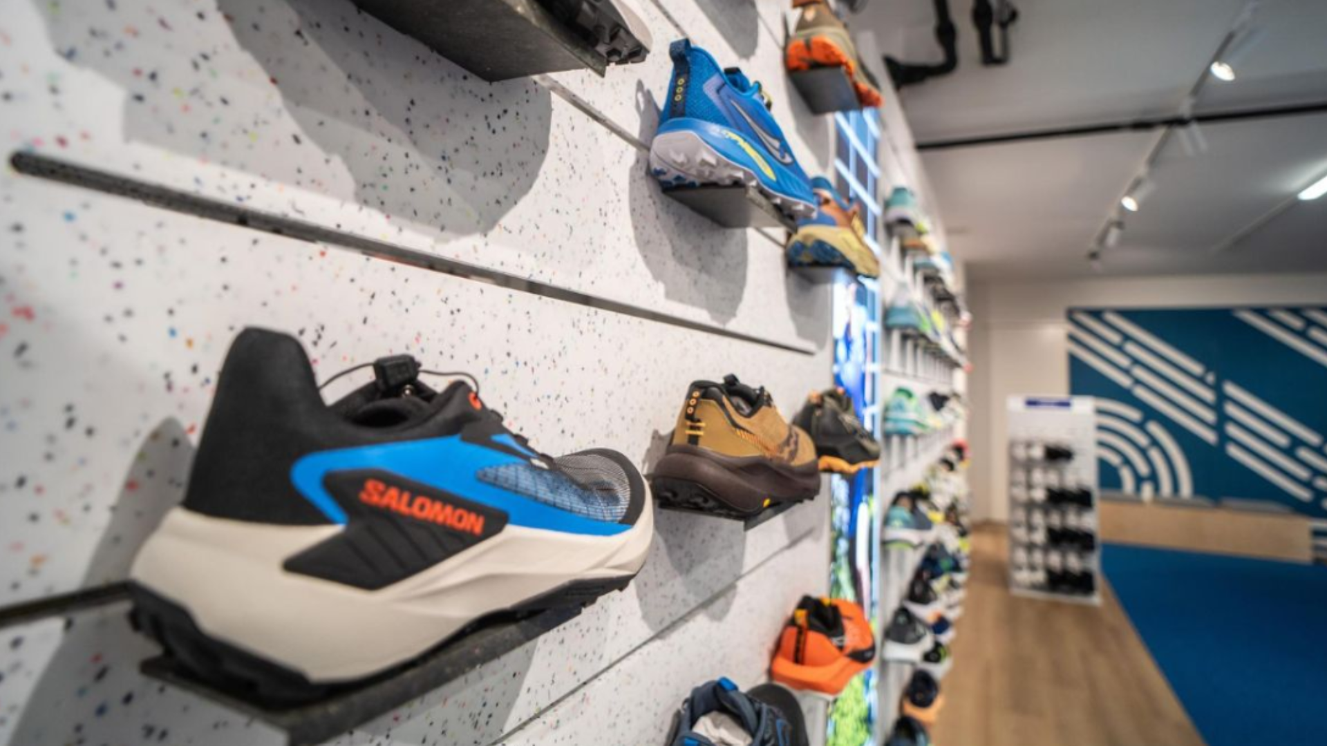 Runnersworld Loop store in Eindhoven, built from 22,000 recycled shoes, launch of Utilitarian circular app.